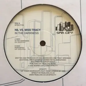 Nil vs. Miss Tracy – In The Darkness